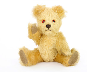 Old scruffy cute teddy bear soft toy