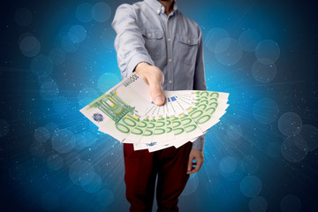 Businessman holding money