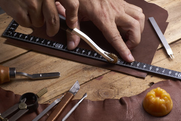 Man working with leather