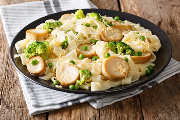 Homemade pasta with King Brown Mushroom, cheese and vegetables close-up. Horizontal