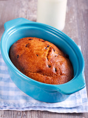 Chocolate chip pudding in a tin
