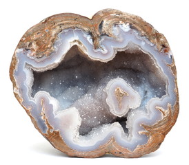 A polished geode filled with blue Chalcedony that is coverd in a thin layer of Quartz crystals. This specimen was found in Dugway, Utah, USA. - obrazy, fototapety, plakaty