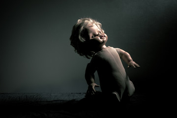 Creepy doll in the dark