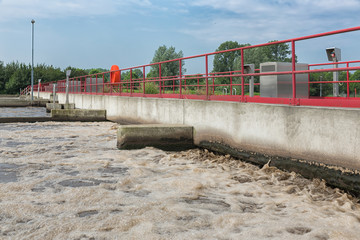 Sewage treatment plant. After primary sedimentation is the secondary basin for activating and...