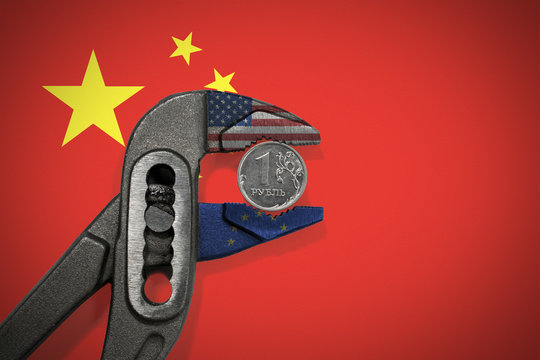 The coin in vise on the background of flag of China as a symbol of economic sanctions against of Russia - Powered by Adobe