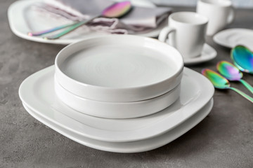 Stack of plates on table