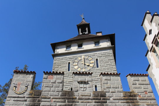 Historical Schnetztor gate of the former city walls built in 14th century isolated on blue sky in the city of Constance (Konstanz) in Baden-Wuerttemberg, Germany.