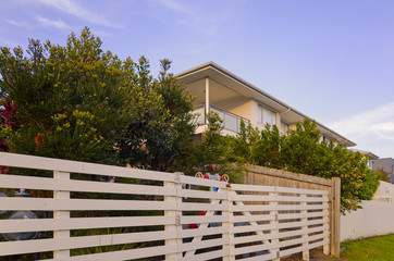 Modern residential apartment building exterior with balconies and windows