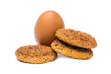 Easter cookies and egg on white background
