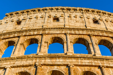 Obraz premium Night view of the Colosseum or Coliseum, the Flavian Amphitheatr