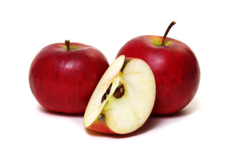Apple with slice on a white