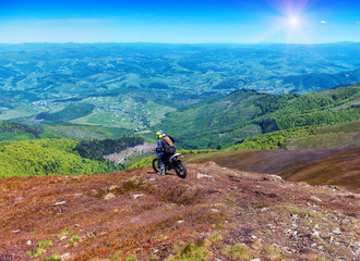 Fototapeta premium motorcyclist riding in the mountains