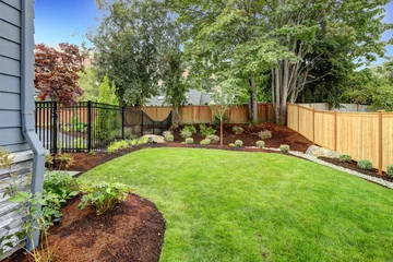 Wall murals Pistache Nice fenced backyard with new planting beds