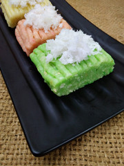 Getuk, Indonesia Traditional Snack Food, made from Steamed Cassava and grated coconut for Topping