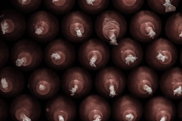 Christmas candles made from wax on isolated background