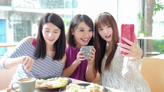 woman friends smile and selfie