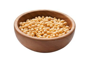 soaked raw Chickpea in wooden plate. Isolated.