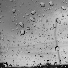 Rain of Drop Water on Glass.
