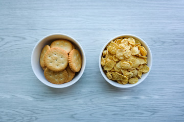biscuit and corn flakes in the cups