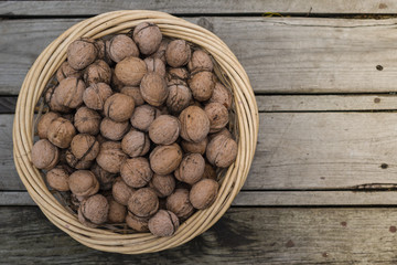 Voloshsky walnut on an old wooden background