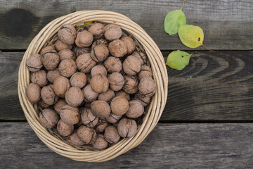 Voloshsky walnut on an old wooden background