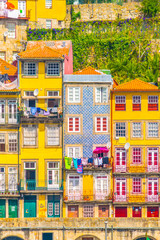 Colourful houses along river douro in Porto, Portugal. - obrazy, fototapety, plakaty