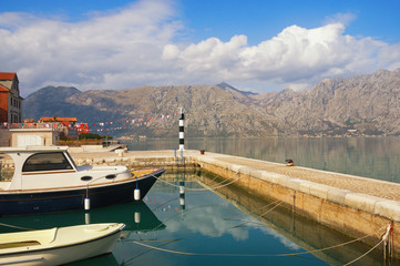 Waiting for spring. Bay of Kotor near Prcanj town on a sunny winter day. Montenegro