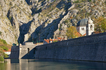 Montenegro, ancient fortress of  Old Town of Kotor .  View of northern walls, Skurda river and Riva...
