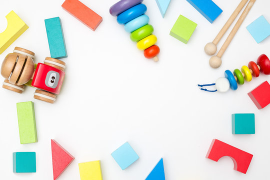 Different children's wooden toys on a white background. Mockup