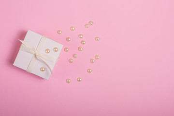 Gift box on a pink background