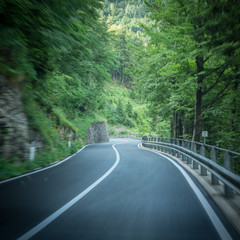 Driving downhill through switchbacks in the Alps