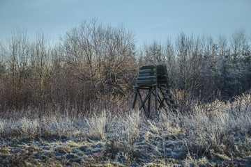 high seat for hunters in winter forest