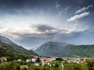 Fototapeta na wymiar Threatening stormy clouds over small city, Vittorio Veneto, Veneto, Italy