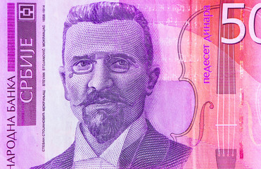 Serbian 500 dinara currency banknote, close up. Serbia money RSD dinar cash, macro view.