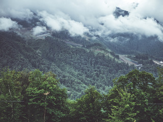 Naklejka premium clouds above the mountain forest tropic foggy