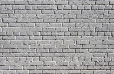 Obraz premium Painted white brick wall textured background in the sunlight