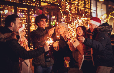 Friends With Sparklers At The New Year Party