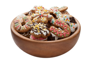 gingerbread in wooden bowl. Isolated.