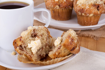 Sliced Muffin with Cup of Coffee on a Plate