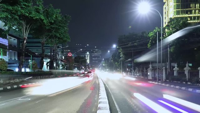 JAKARTA, Indonesia. November 13, 2017: Stop motion of night traffic on Jakarta road. Shot in 4k resolution