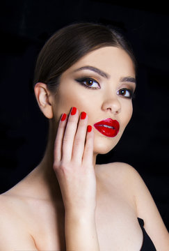 beautiful girl portrait with red lips and classy hairstyle elegant evening make up look concept