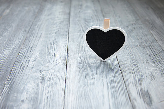 little heart a wooden gray background