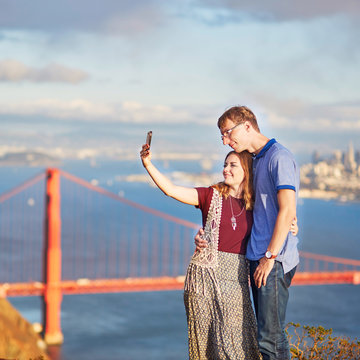 Romantic loving couple making selfie in San Francisco, California, USA