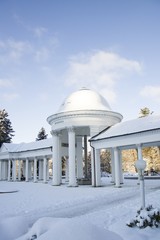 Colonnade of mineral water springs - winter and snow in spa resort Marianske Lazne (Marienbad) -...