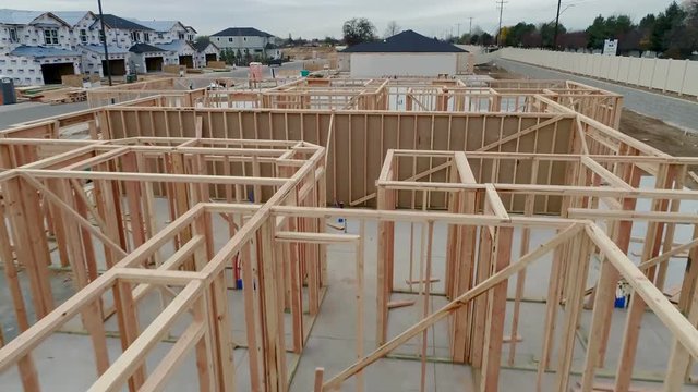 Flyover new construction homes with only studs for walls