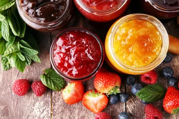 Poster assortment of jams, seasonal berries, plums, mint and fruits © beats_