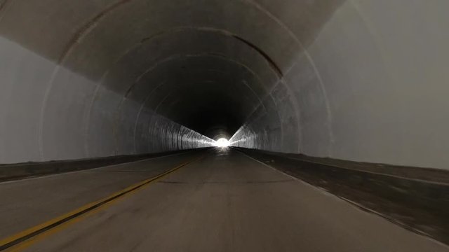 Driving time lapse through the Angeles Crest Highway tunnels in the San Gabriel Mountains above Los Angeles in Southern California.
