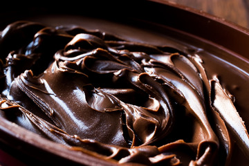 Sweet Dark Chocolate Cream in a brown  bowl.