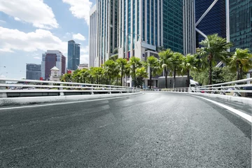 Foto op Plexiglas empty asphalt road with modern buildings © zhu difeng