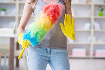 Woman doing cleaning at home